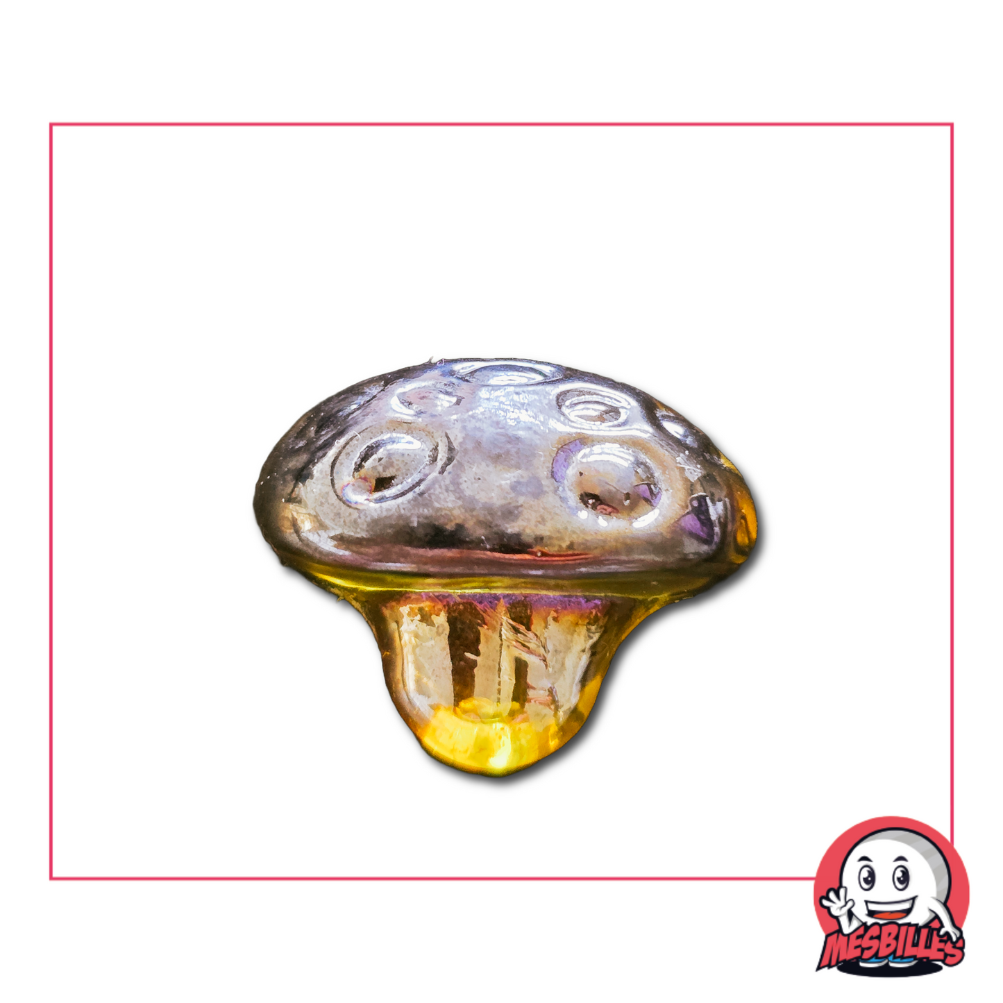 Foto de una canica de vidrio con forma de seta de 3 cm, con sombrero gris ámbar y pie amarillo translúcido, vendida por unidad en MisCanicas.