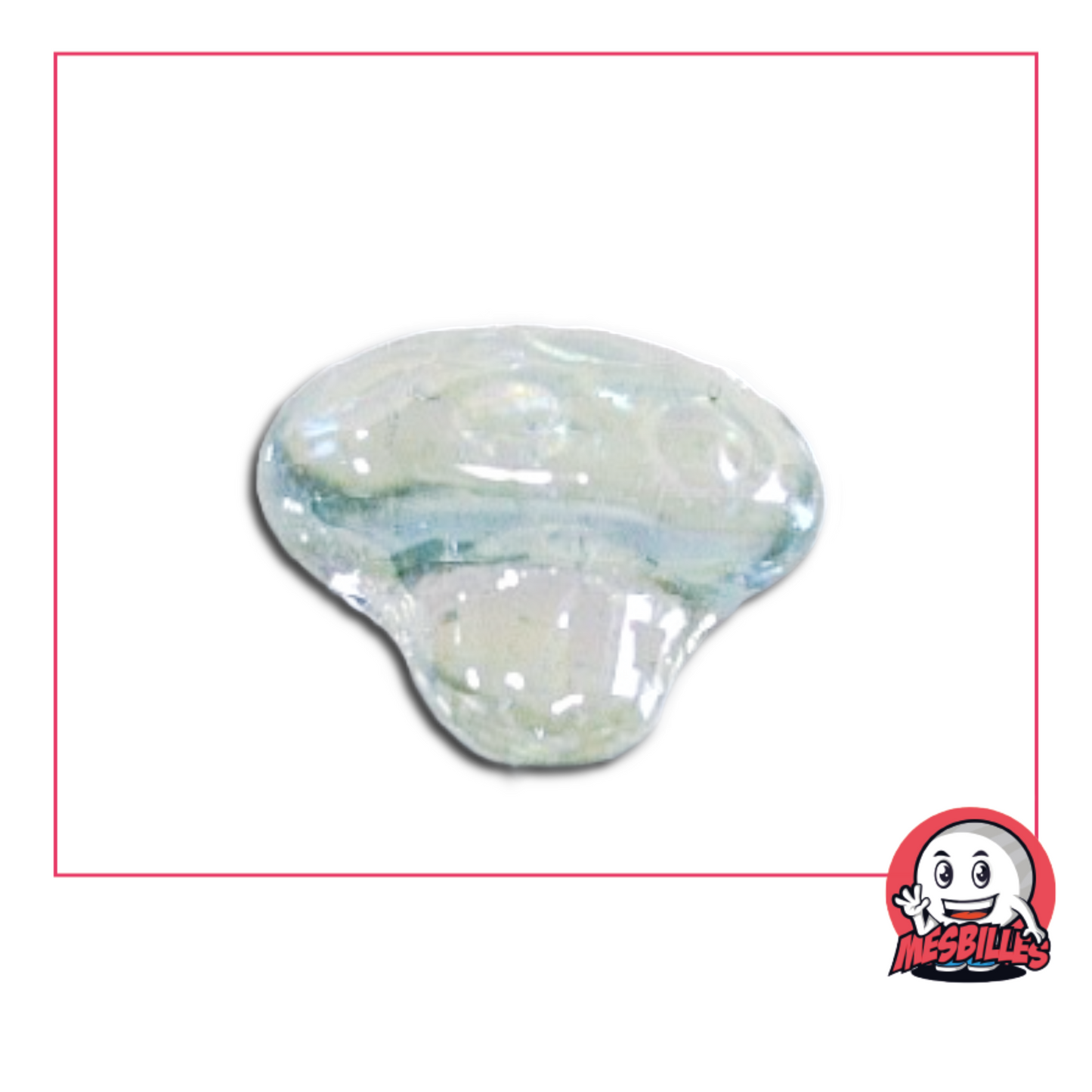 Foto de una canica con forma de seta pequeña de cristal translúcido claro, vendida por unidad en la tienda MisCanicas.