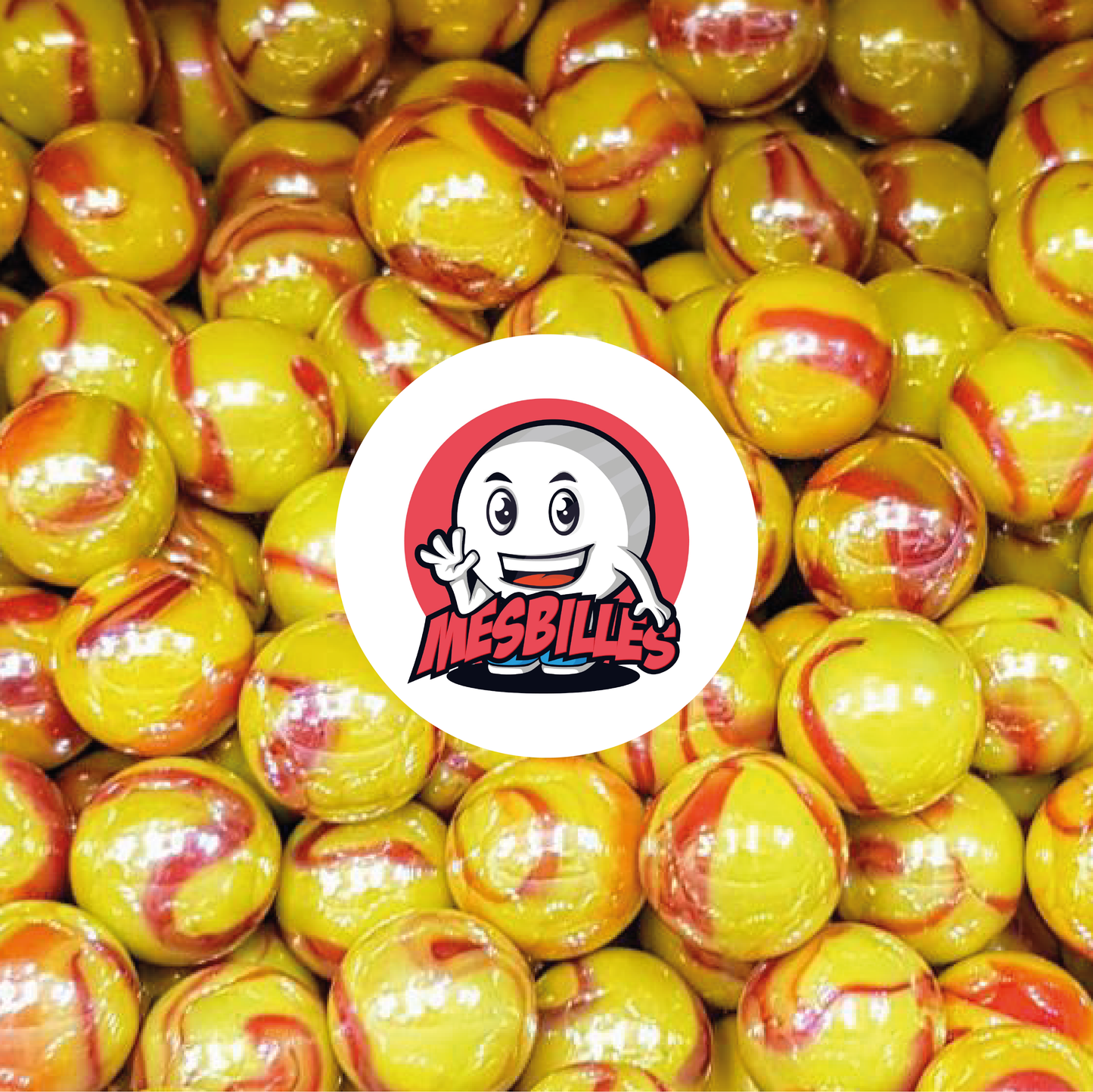 Imagen de la mascota MisCanicas rodeada de canicas Dragón de 35 mm - Increíble combinación de amarillo y rojo en un vidrio opaco y brillante