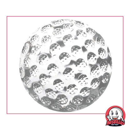 Foto de una canica de 60 mm de vidrio transparente, con relieve tipo pelota de golf, vendida por unidad en MisCanicas.