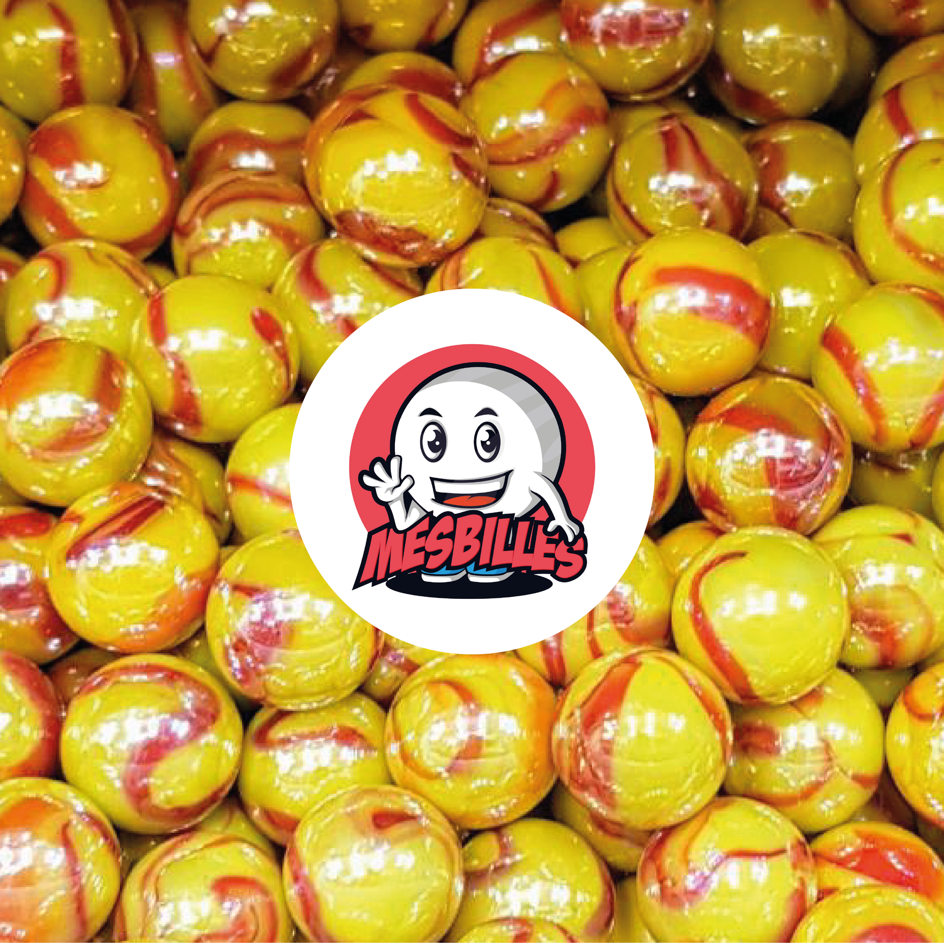 Imagen de la mascota MisCanicas rodeada de canicas Dragón de 35 mm - Increíble combinación de amarillo y rojo en un vidrio opaco y brillante